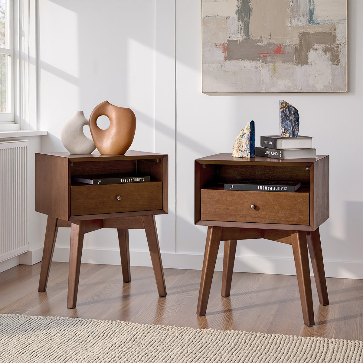 Pair of walnut Boneva nightstands with built-in outlets